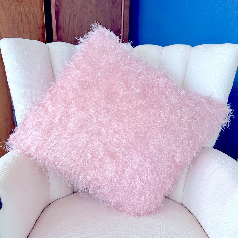 Super soft pink fuzzy pillow